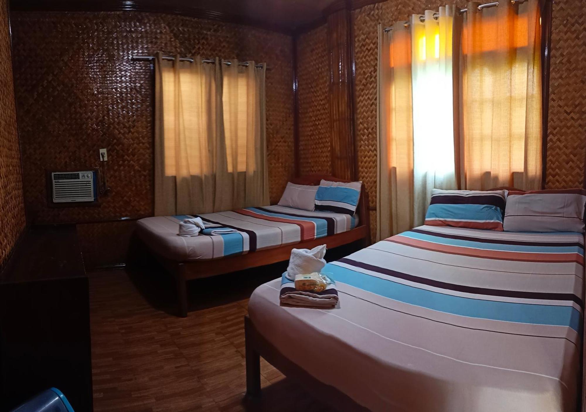 Victoria Guest House And Cottages Puerto Princesa Extérieur photo